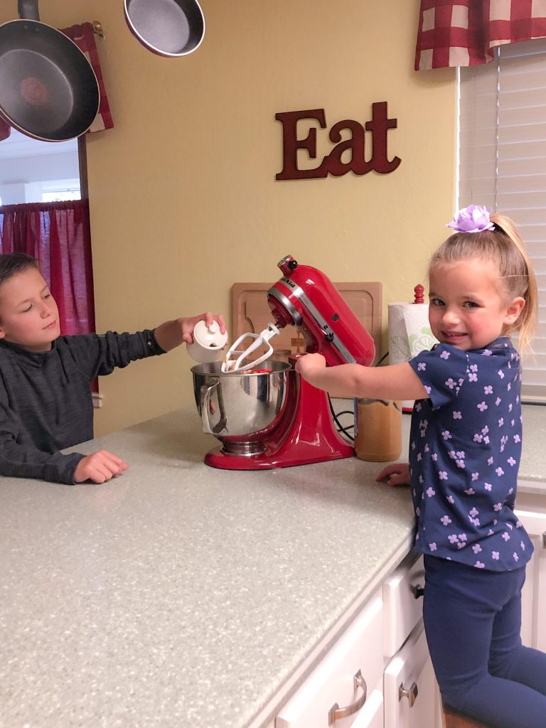 boy and girl baking cookies