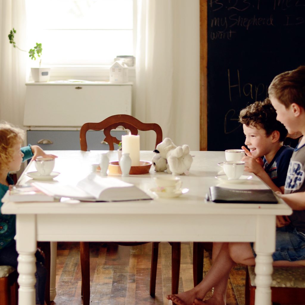 children sitting at a table