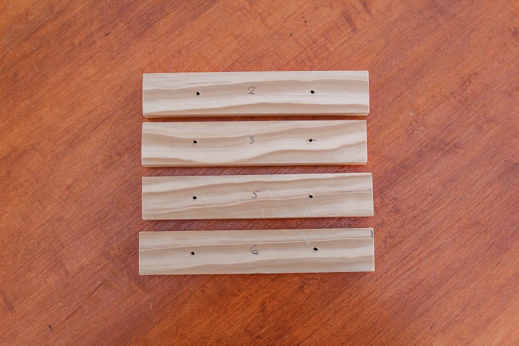 boards cut with holes pre-drilled for screws